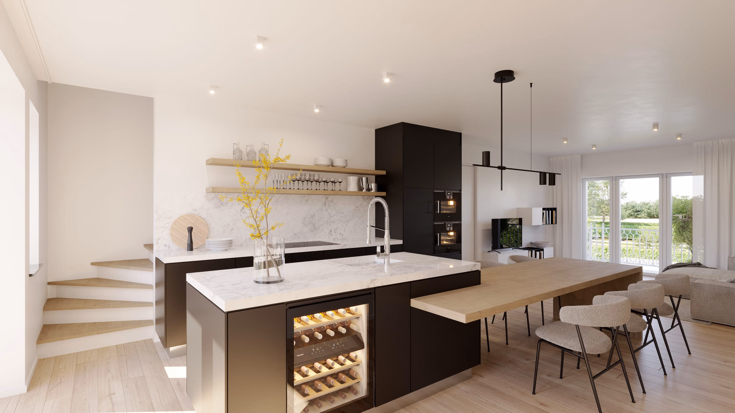 Keuken met zwart eiland en eettafel in een appartement van de dokterswoning